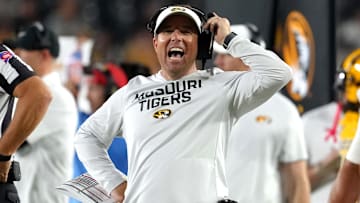Missouri Tigers head coach Eliah Drinkwitz laughs on the sidelines, during a game against the UMass Minutemen this season.