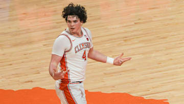 Feb 26, 2025; Clemson, South Carolina, USA;  Clemson senior forward Ian Schieffelin (4) reacts after making a three-point shot against Notre Dame during the first half at Littlejohn Coliseum. Mandatory Credit: Ken Ruinard-Imagn Images