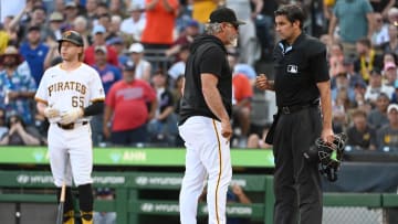 Jul 6, 2024; Pittsburgh, Pennsylvania, USA; Pittsburgh Pirates manager Derek Shelton (17) gets ejected from the game by homeplate umpire John Tumpane (74) after a seventh-inning call on batter Jack Suwinski (65) against the New York Mets at PNC Park. Mandatory Credit: Philip G. Pavely-USA TODAY Sports