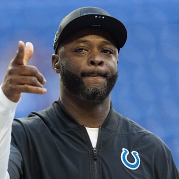 Indianapolis Colts wide receivers coach Reggie Wayne interacts with fans Sunday, Oct. 12, 2025, ahead of the game against the Arizona Cardinals at Lucas Oil Stadium in Indianapolis.