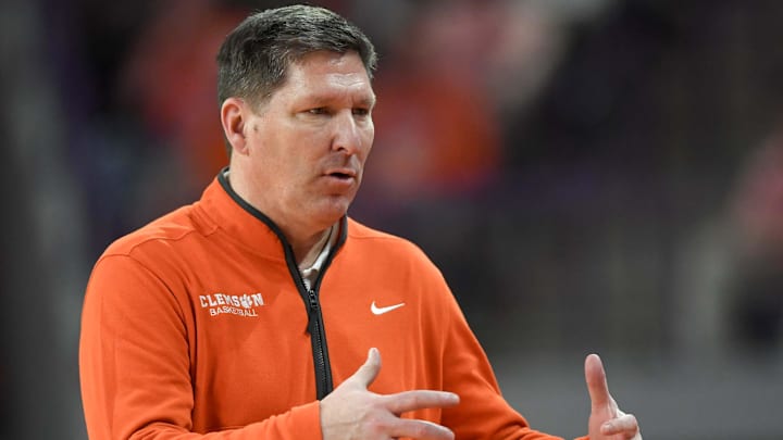 Feb 26, 2025; Clemson, South Carolina, USA; Clemson Head Coach Brad Brownell reacts with the team in the game against Notre Dame during the second half at Littlejohn Coliseum. Mandatory Credit: Ken Ruinard-Imagn Images