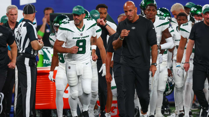 Aug 26, 2023; East Rutherford, New Jersey, USA; New York Jets quarterback Aaron Rodgers (8) and head coach Robert Saleh leave the field after the first half of their game against the New York Giants at MetLife Stadium.