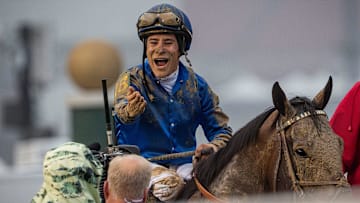 Jockey Junior Alvarado celebrated after riding Sovereignty to victory in the 151st Kentucky Derby at Churchill Downs.