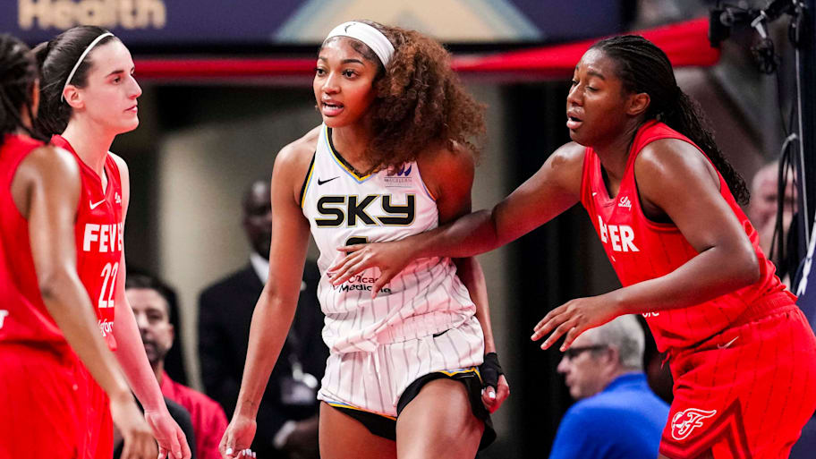 Chicago Sky forward Reese reacts to a flagrant foul from Indiana Fever guard Clark during a game at Gainbridge Fieldhouse in Indianapolis.  | Grace Smith/IndyStar / USA TODAY NETWORK via Imagn Images