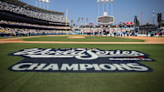 Dodger Stadium's infield shows off a display honoring the 2025 World Series champions in Los Angeles on Monday, Nov. 3, 2025. The Dodgers beat the Toronto Blue Jays in seven games to win their second straight World Series title and third in last six years.