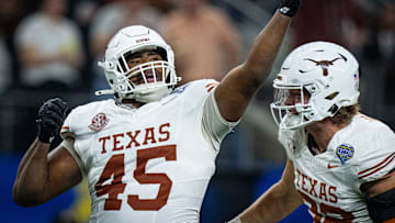 Texas Longhorns defensive lineman Vernon Broughton (45) celebrates a quarterback sack in the third quarter as the Texas Longhorns play the Ohio State Buckeyes.