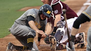 Mizzou's Dillion Everett slides past Missouri State catcher Luke Voit on Tuesday night at Hammons Field.

Baseball Missouri 5 Missouri State 4
