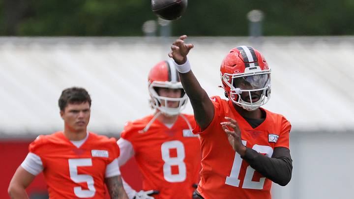 Browns quarterback Shedeur Sanders throws as QBs Dillon Gabriel (5) and Kenny Pickett look on during minicamp, Tuesday, June 10, 2025, in Berea.
