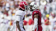 Sep 14, 2019; Columbia, SC, USA; Alabama Crimson Tide wide receiver Jerry Jeudy (4) and South Carolina Gamecocks defensive back Jaycee Horn (1) exchange words at Williams-Brice Stadium. Mandatory Credit: Jeff Blake-Imagn Images