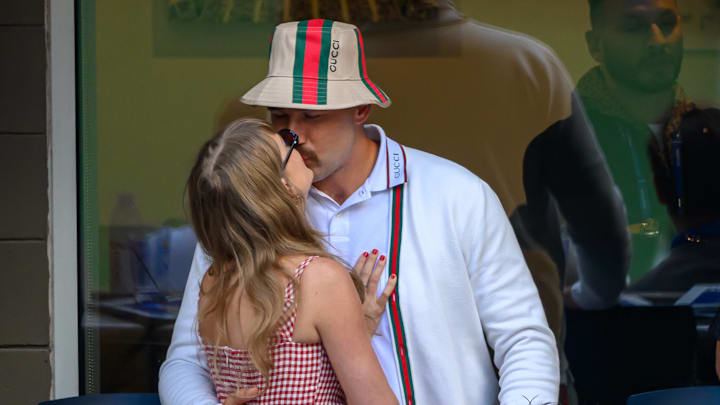 Taylor Swift kisses boyfriend Travis Kelce while attending the US Open.