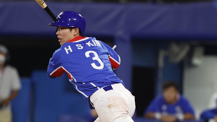 Aug 5, 2021; Yokohama, Japan; Team South Korea infielder Hyeseong Kim (3) hits a single in the third inning against USA in a baseball semifinal match during the Tokyo 2020 Olympic Summer Games at Yokohama Baseball Stadium. Mandatory Credit: Yukihito Taguchi-Imagn Images
