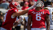 Indiana's Mikail Kamara (6) and Aiden Fisher (4) celebrate a sack of Kennesaw State's Amari Odom (2) during the Indiana versus Kennesaw State Big Ten football game at Memorial Stadium on Saturday, Sept. 6, 2025.