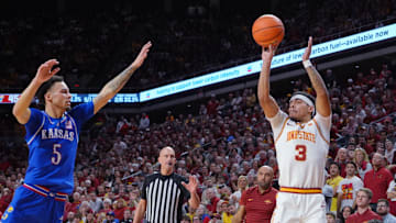 Iowa State Cyclones guard Tamin Lipsey (3) takes a three-point shot over Kansas Jayhawks guard Zeke Mayo (5) during the second half in the Big-12 men’s basketball showdown at Hilton Coliseum on Wednesday, Jan. 15, 2025 in Ames, Iowa.