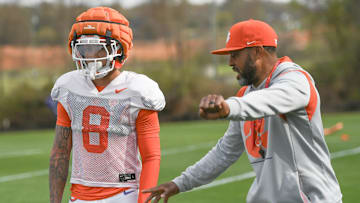 Clemson cornerbacks coach Mike Reed instructs Avieon Terrell (8) during Spring Practice in Clemson, S.C. Monday, March 24, 2025.