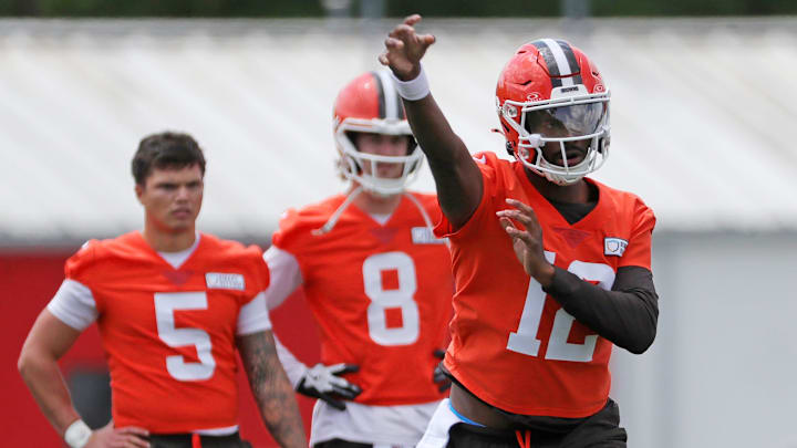 Browns quarterback Shedeur Sanders throws as QBs Dillon Gabriel (5) and Kenny Pickett look on during minicamp, Tuesday, June 10, 2025, in Berea. Browns quarterback Shedeur Sanders throws as QBs Dillon Gabriel (5) and Kenny Pickett look on during minicamp, Tuesday, June 10, 2025, in Berea.
