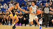 Mansfield Summit's Sam Getnet (10) looks for an outlet around Fort Bend Marshall's Armani Theus (1) during the 2025 UIL Class 5A Division 2 championship on Saturday, March 8, 2025, at the Alamodome in San Antonio.