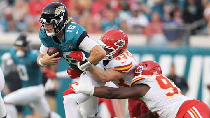 Kansas City Chiefs linebacker Jack Cochrane (43) and defensive tackle Matt Dickerson (93) make the sack on Jacksonville Jaguars quarterback Trevor Lawrence (16) during late first quarter action. The Jaguars led 20 to 10 at the end of the first half. The Jacksonville Jaguars hosted the Kansas City Chiefs in the Jaguars first preseason game of the season Saturday, August10, 2024 at EverBank Stadium in Jacksonville, Fla. [Bob Self/Florida Times-Union]