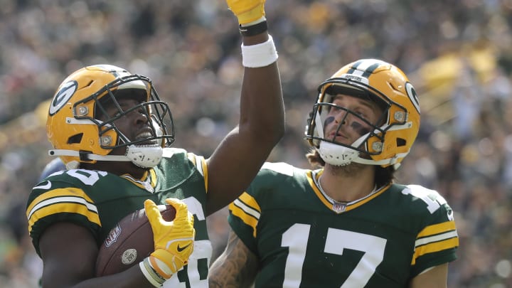 Green Bay Packers running back Nate McCrary (46) and quarterback Alex McGough celebrate a touchdown vs. the Seahawks.