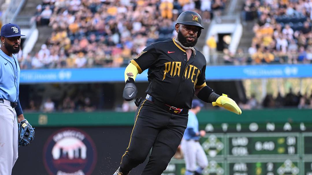 Apr 17, 2026; Pittsburgh, Pennsylvania, USA; Pittsburgh Pirates designated hitter Marcell Ozuna passes Tampa Bay Rays third baseman Junior Caminero to score during the second inning at PNC Park. Mandatory Credit: Philip G. Pavely-Imagn Images Apr 17, 2026; Pittsburgh, Pennsylvania, USA; Pittsburgh Pirates designated hitter Marcell Ozuna passes Tampa Bay Rays third baseman Junior Caminero to score during the second inning at PNC Park. Mandatory Credit: Philip G. Pavely-Imagn Images