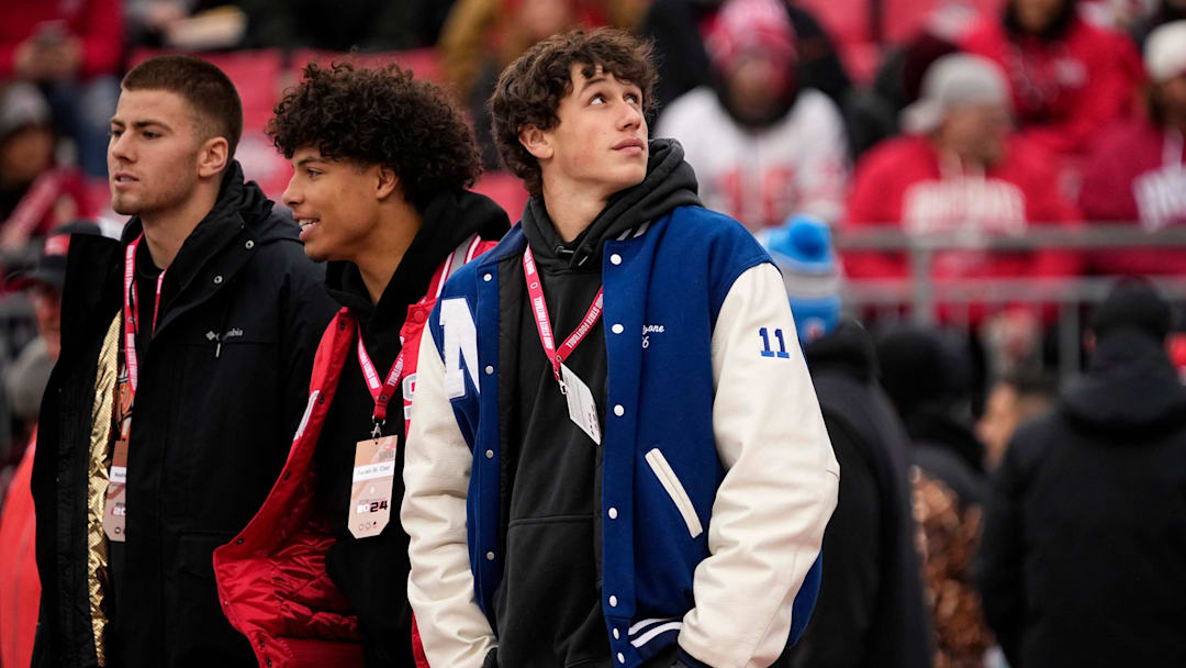 Nazareth Academy quarterback Peyton Falzone, right, watches warm ups with Bellefontaine quarterback Tavien St. Clair prior to the NCAA football game against the Indiana Hoosiers at Ohio Stadium in Columbus on Saturday, Nov. 23, 2024.