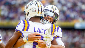 Kyren Lacy 2 and Jayden Daniels 5 celebrate after a touchdown as the LSU Tigers take on Texas A&M in Tiger Stadium in Baton Rouge, Louisiana, November 25, 2023.