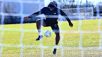 WORCESTER - Soccer player Jean Paul Boderbe, 18, of Worcester practices his fancy footwork at the Green Hill Park athletic field on Tuesday. Boderbe, a graduate of Burncoat High School now plays for United Premier Soccer League's UNations Football Club.