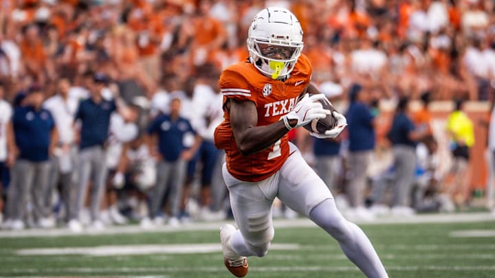 Sep 14, 2024; Austin, Texas, USA; Texas Longhorns wide receiver Johntay Cook II (1) runs the ball for a touchdown against the UTSA Roadrunners in the first quarter at Darrell K Royal–Texas Memorial Stadium. Mandatory Credit: Sara Diggins/USA TODAY Network via Imagn Images Sep 14, 2024; Austin, Texas, USA; Texas Longhorns wide receiver Johntay Cook II (1) runs the ball for a touchdown against the UTSA Roadrunners in the first quarter at Darrell K Royal–Texas Memorial Stadium. Mandatory Credit: Sara Diggins/USA TODAY Network via Imagn Images