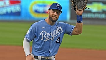 Sep 26, 2020; Kansas City, Missouri, USA;  Kansas City Royals left fielder Alex Gordon (4) waves to family and friends in the press box during the first inning against the Detroit Tigers at Kauffman Stadium. Mandatory Credit: Peter Aiken-Imagn Images
