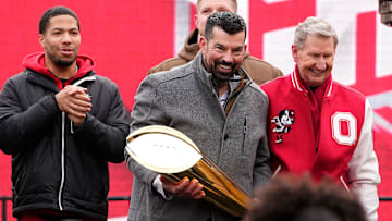 Ohio State Buckeyes head coach Ryan Day holds the College Football Playoff trophy during the Ohio State Buckeyes National Championship celebration at Ohio Stadium in Columbus on Jan. 26, 2025.