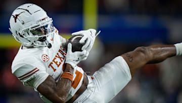 Texas Longhorns wide receiver Matthew Golden (2) catches a pass in the fourth quarter as the Texas Longhorns play the Ohio State Buckeyes in the Cotton Bowl College Football Playoff semi-final at AT&T Stadium in Dallas, Texas, Jan. 10, 2025.