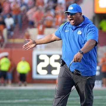 BYU Cougars head coach Kalani Sitake celebrates after the Cougars stopped the Texas Longhorns in the red zone in the fourth quarter at Royal-Memorial Stadium on Saturday October 28, 2023.