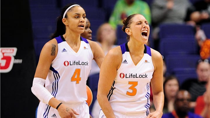 Sep 25, 2011; Phoenix, AZ, USA; Phoenix Mercury forward 	Candice Dupree (4) and teammate guard Diana Taurasi (3) react on the court while playing against the Minnesota Lynx during the first half at the US Airways Center. Mandatory Credit: Jennifer Stewart-Imagn Images