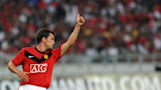 Michael Owen gestures during a Mancheste