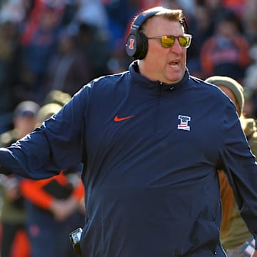 Nov 11, 2023; Champaign, Illinois, USA;  Illinois Fighting Illini head coach Bret Bielema reacts to a call during the second half against the Indiana Hoosiers at Memorial Stadium. Mandatory Credit: Ron Johnson-Imagn Images