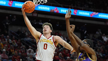 Iowa State Cyclones guard  (0) goes for a layup around Alcorn State Braves forward  (2) during the first half on Dec. 3, 2025, at Hilton Coliseum, in Ames, Iowa.
