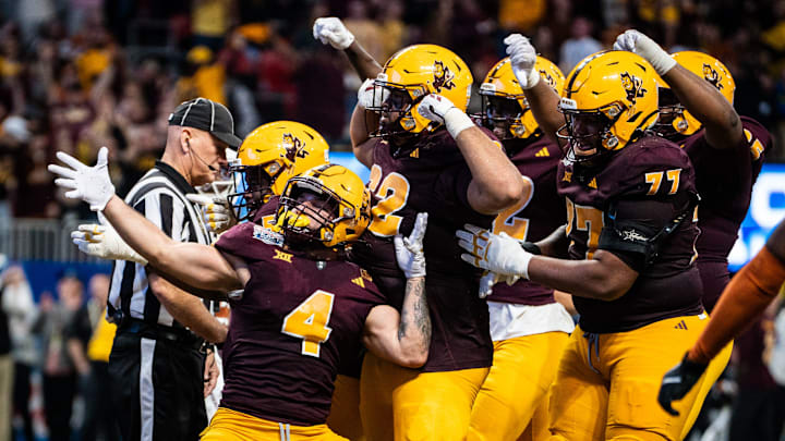 Arizona State celebrate together after Arizona State Sun Devils running back Cam Skattebo (4) scores a touchdown in the fourth quarter as the Texas Longhorns play the Arizona State Sun Devils in the Peach Bowl College Football Playoff quarterfinal at Mercedes-Benz Stadium in Atlanta, Georgia, Jan. 1, 2025.