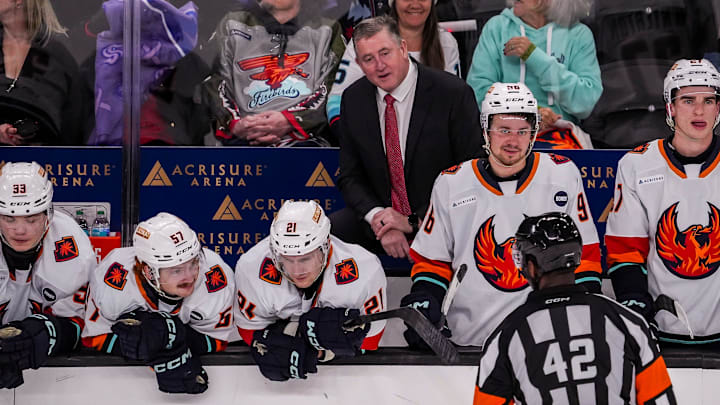 Coachella Valley head coach Derek Laxdal talks with an official after a too many men call during the third period of their game at Acrisure Arena in Palm Desert, Calif., Tuesday, Dec. 31, 2024.