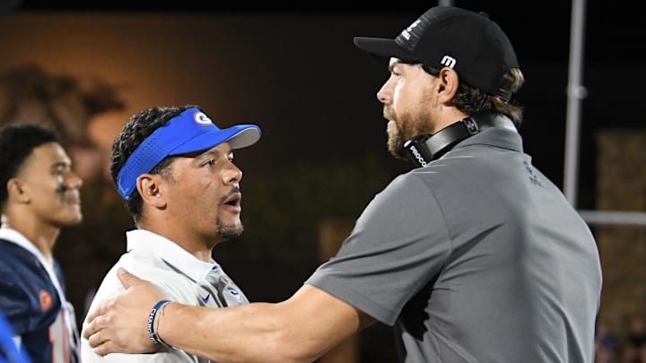 Corner Canyon (Utah) high school football coach Eric Kjar (right) has the Chargers ranked in the national Top 25 once again.