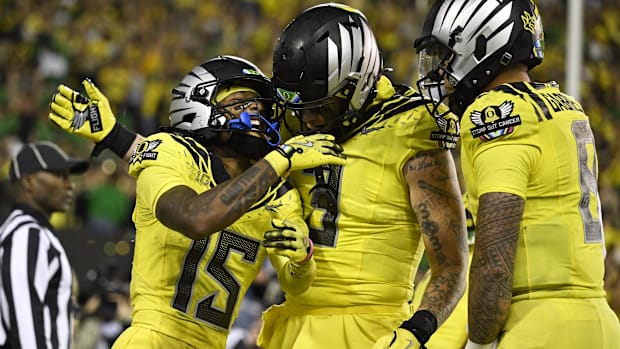 Oct 4, 2024; Eugene, Oregon, USA; Oregon Ducks wide receiver Tez Johnson (15) celebrates with tight end Terrance Ferguson (3)