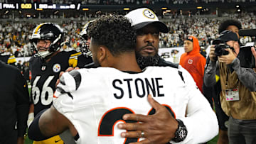 Pittsburgh Steelers head coach Mike Tomlin, Cincinnati Bengals safety Geno Stone