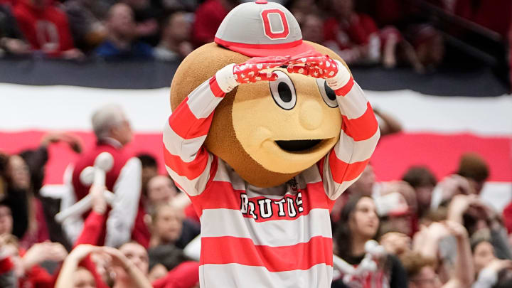 Jan 10, 2024; Columbus, Ohio, USA; Ohio State Buckeyes mascot, Brutus, cheers during the second half of the NCAA men   s basketball game against the Wisconsin Badgers at Value City Arena. Ohio State lost 71-60.