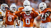 Texas Longhorns linebacker Anthony Hill Jr. (0) celebrates sacking Louisiana Monroe Warhawks quarterback General Booty (14) in the first half of the Texas Longhorns' game against the ULM Warhawks at Darrell K Royal Texas Memorial Stadium.
