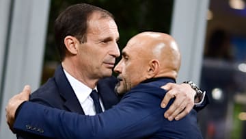Massimiliano Allegri (L), head coach of Juventus FC, hugs...