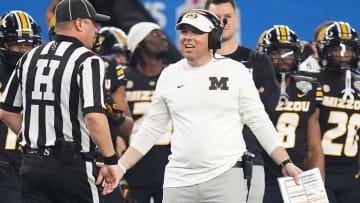 Dec 29, 2023; Arlington, Texas, USA; Missouri Tigers head coach Eliah Drinkwitz argues with an official during the first quarter of the Goodyear Cotton Bowl Classic against the Ohio State Buckeyes at AT&T Stadium.