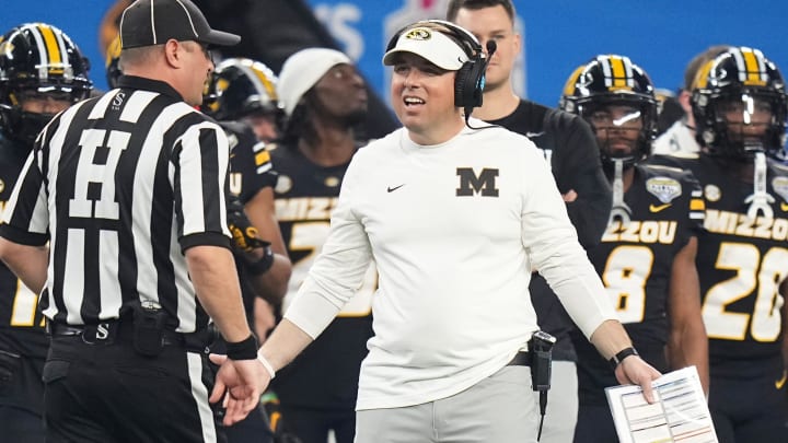 Dec 29, 2023; Arlington, Texas, USA; Missouri Tigers head coach Eliah Drinkwitz argues with an official during the first quarter of the Goodyear Cotton Bowl Classic against the Ohio State Buckeyes at AT&T Stadium.