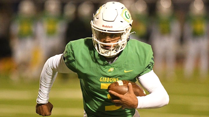 Gibbon's # 3 Gannon Jones takes off for a first down as Hoggard took on Gibbons Friday Dec. 6, 2024 in the Round 4 of 2024 NCHSAA playoff in Raleigh, N.C. Hoggard lost 35-0. KEN BLEVINS/STARNEWS