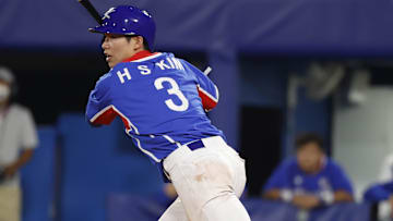 Aug 5, 2021; Yokohama, Japan; Team South Korea infielder Hyeseong Kim (3) hits a single in the third inning against USA in a baseball semifinal match during the Tokyo 2020 Olympic Summer Games at Yokohama Baseball Stadium. Mandatory Credit: Yukihito Taguchi-Imagn Images