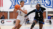 Saniyah Hall (left) of Montverde Academy drives to the basket while defended by IMG Academy's Nylah Wilson in the title game of 2025 Chipotle Nationals. Hall, the nation's No. 1 recruit from the Class of 2026, committed to USC on Friday. 