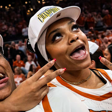 Texas Longhorns forwards Madison Booker (35) and Aaliyah Moore (23) regular season SEC Championship after beating Florida at home in the Moody Center, March 2, 2025.