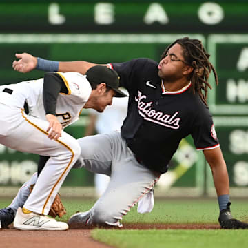 Sep 7, 2024; Pittsburgh, Pennsylvania, USA; Washington Nationals left fielder James Wood (29) steals second base against Pittsburgh Pirates second baseman Alika Williams (25) during the first inning of the second game of a double header at PNC Park.